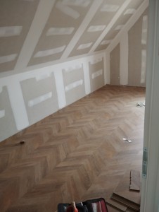 Photo parquet stratifié pointe de hongrie.jpg